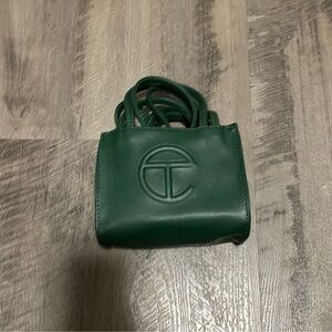 Practically brand new. No scratches or marks on purse